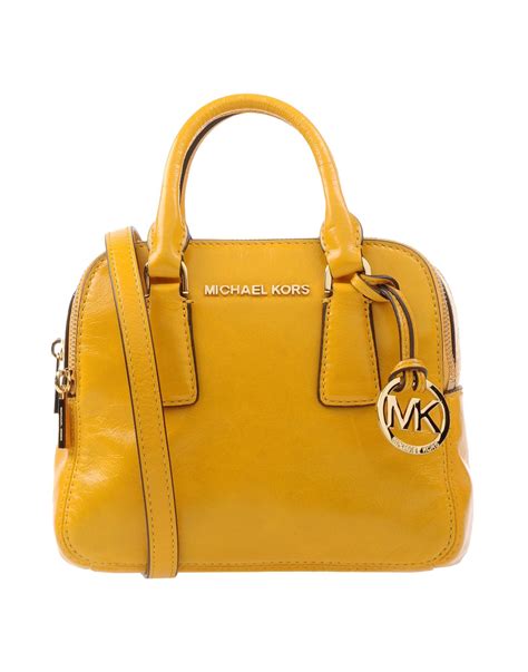 michael kors bright yellow bag|Michael Kors yellow handbags.